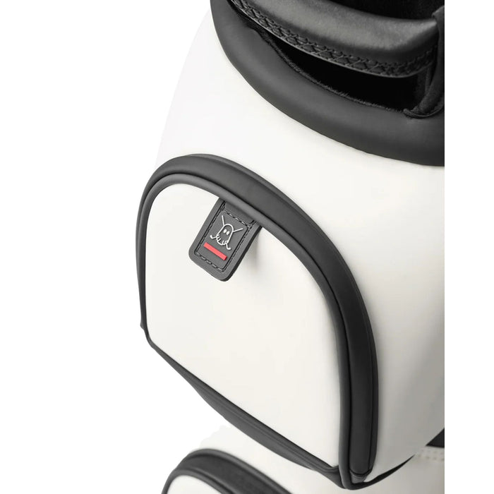 Close-up of the upper pocket and ghost logo tab on the Ghost Golf GT-14 cart bag in Oreo white/black